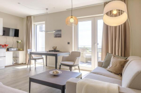 Kleine Strandoase - Ferienwohnung mit Südbalkon, Wellness & Boddenblick in Wustrow